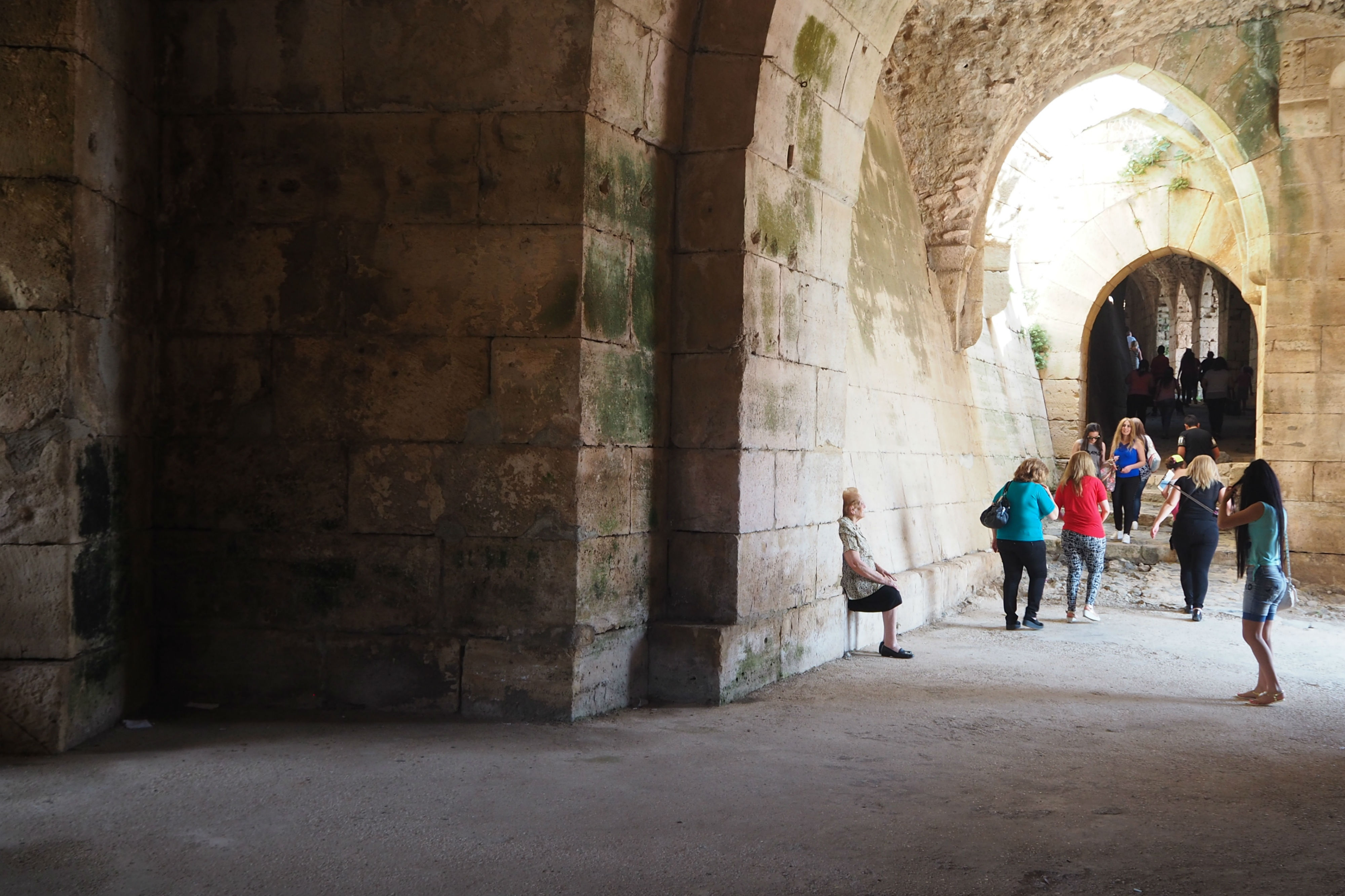 Syrian visitors are starting to return to the castle, although sections were damaged during the war (Tom Westcott/MEE)
