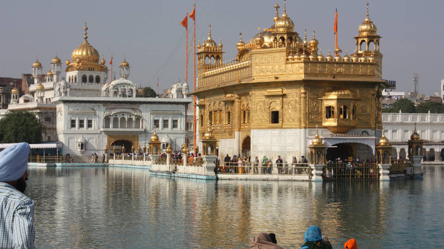 The Golden Temple is surrounded by water and is known as the Pool of Immortality (Arian Zwegers/CC)