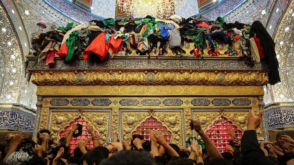 Shia Muslim worshippers gathered around the tomb of Imam Hussein to remember his life (Creative Commons)
