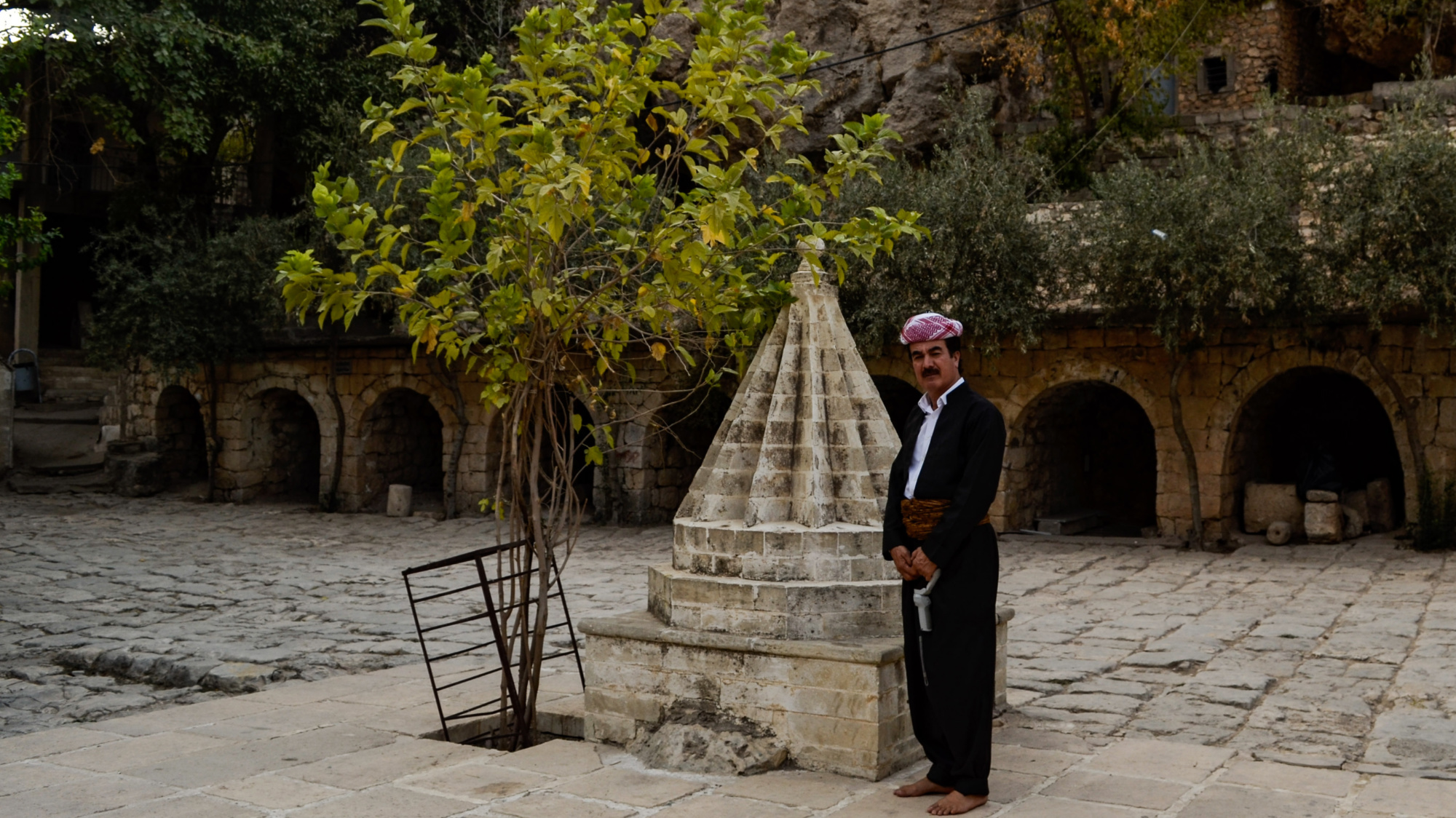 For media activist Luqman Sulaiman, and many others, the closeness of the flares to the Yazidi’s holiest site is a blow to their culture (MEE/Lyse Mauvais)