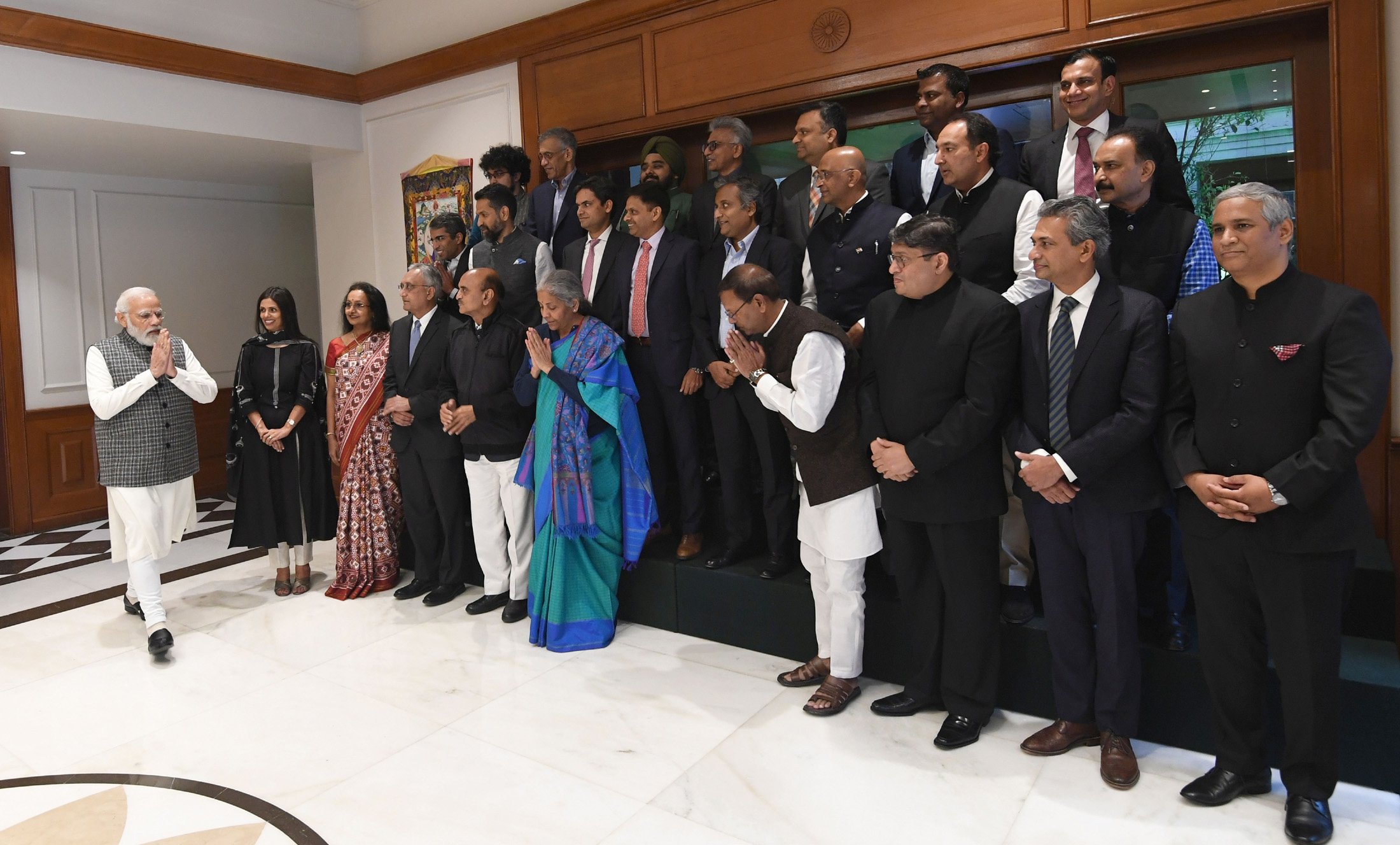 Prashant Prakash (second row, far right) meeting Indian Prime Minister Narendra Modi in the capital New Delhi on 17 December, 2021 (Indian government handout)
