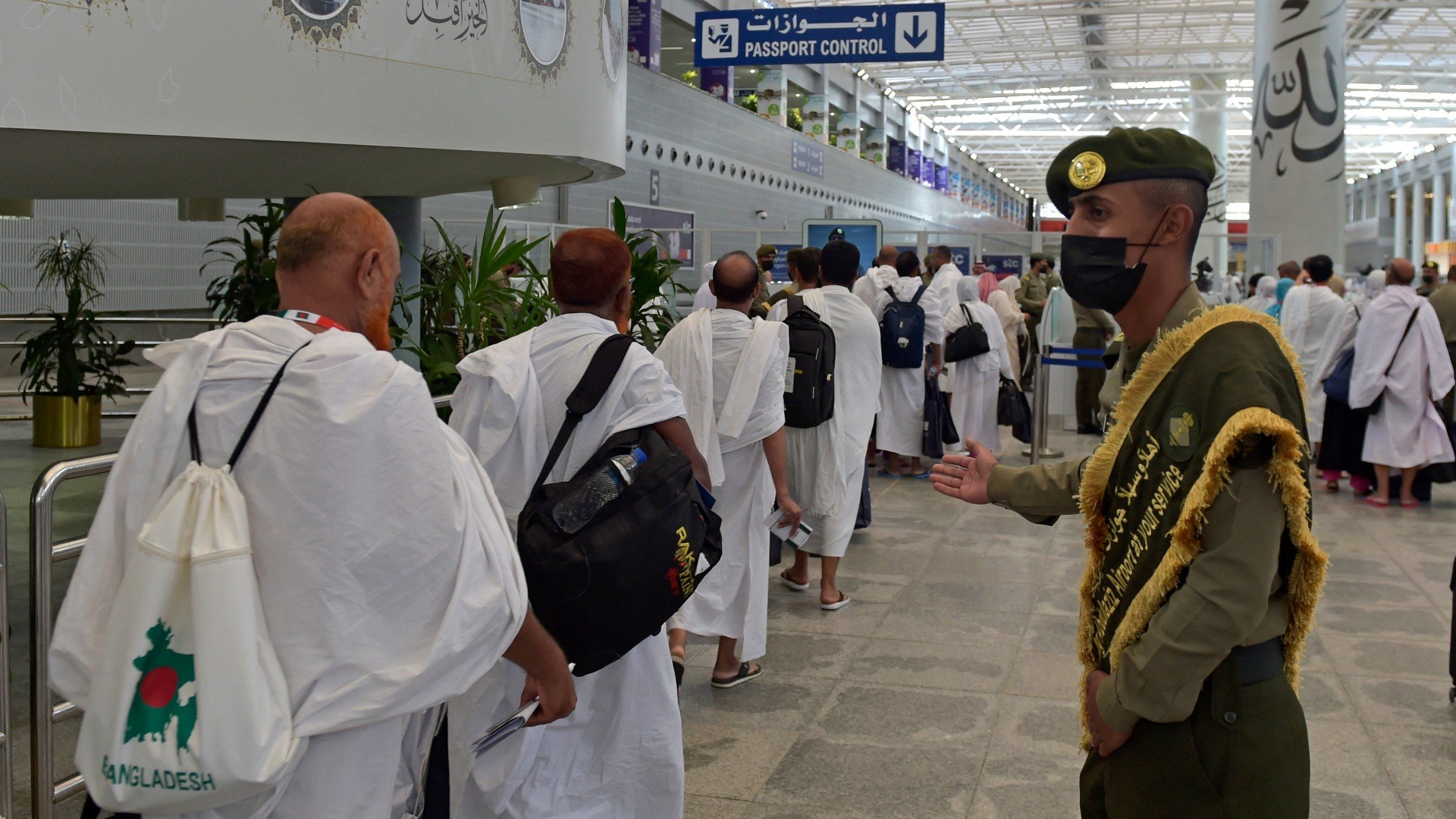 Muslim pilgrims arrive at King Abdulaziz International Airport in Saudi Arabia's Red Sea coastal city of Jeddah on June 5, 2022
