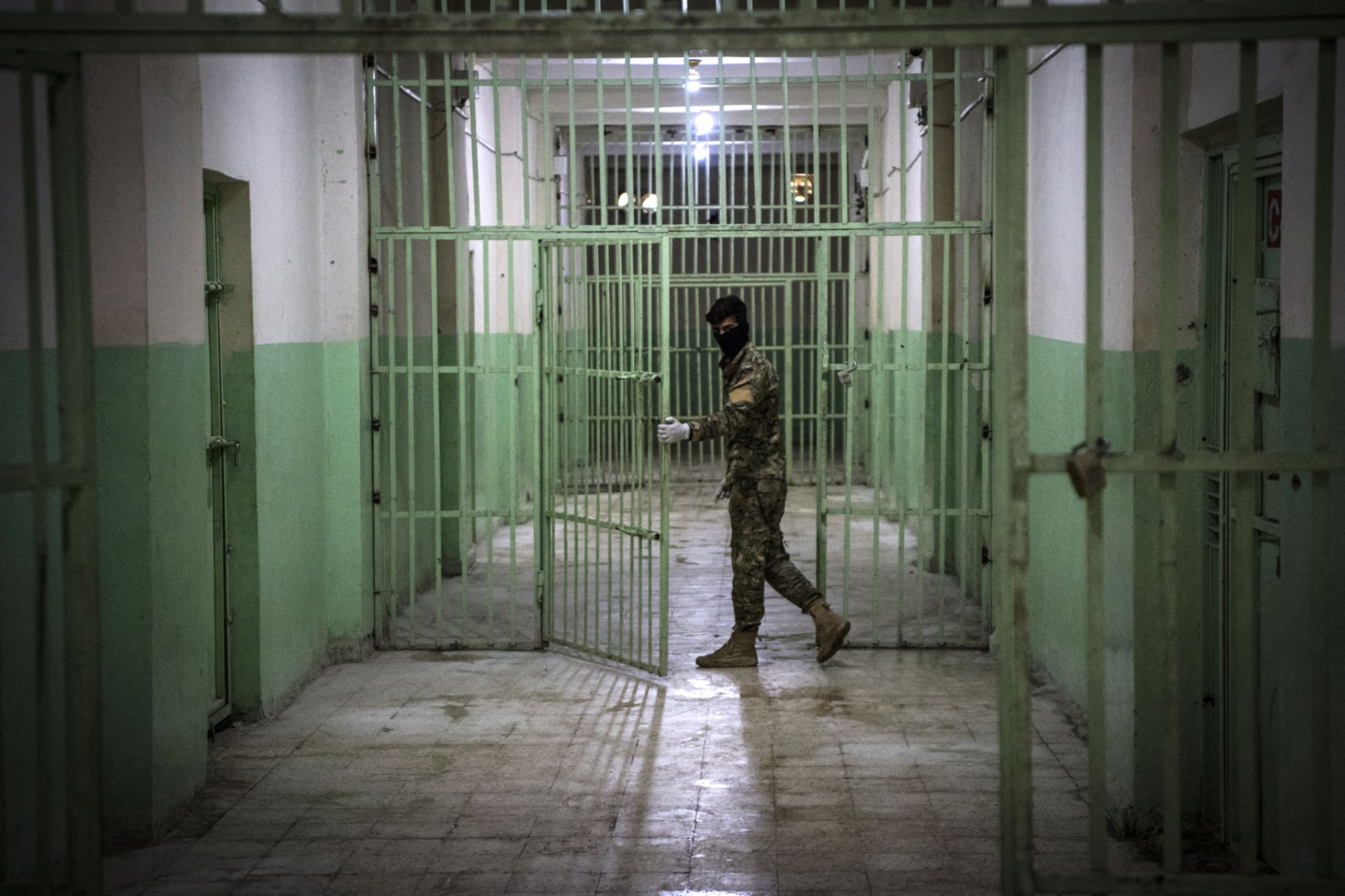 A guard in a Syrian prison in the northeast of the country (AFP)