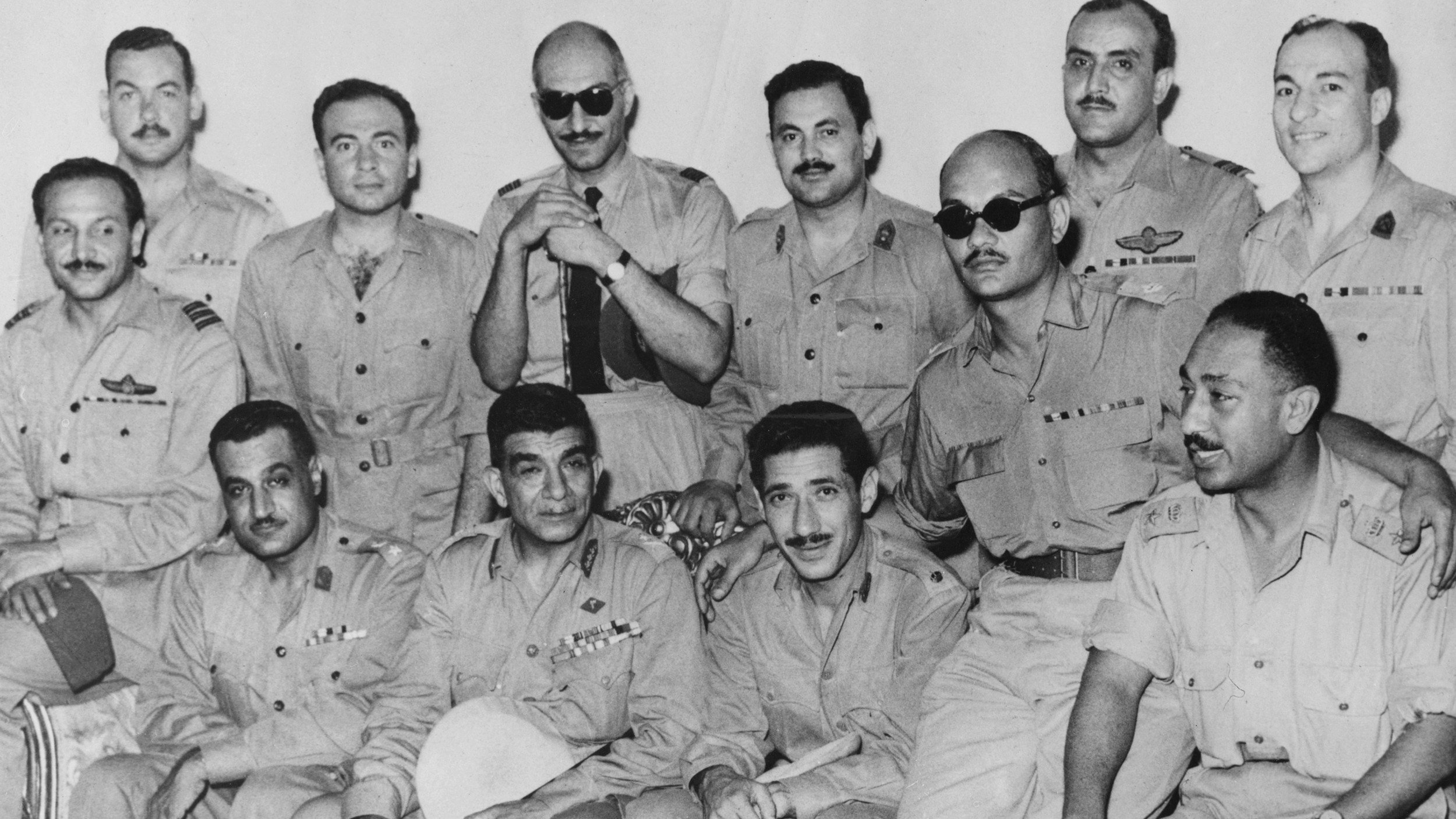 The twelve man Revolutionary Council which proclaimed Egypt a Republic is pictured at the Council's headquarters, Cairo on 19 June, 1953 (AFP)