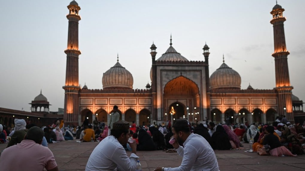 Muslims break their fast at the Jama Masjid mosque during Islam's Holy month of Ramadan in the old quarters of Delhi on April 13, 2022.