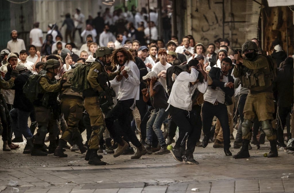 Israeli security forces deploy amid altercations between Jewish settlers on their way to visit the tomb of Othniel ben Kenaz in the area H1 (controlled by Palestinian authorities) and Palestinian residents, in the occupied West Bank city of Hebron, on November 19, 2022