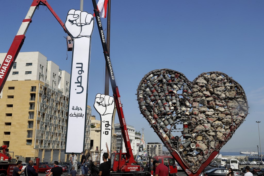 The 'revolution fist', a symbol of Lebanon's uprising, is pictured in Beirut on 22 October (AFP)