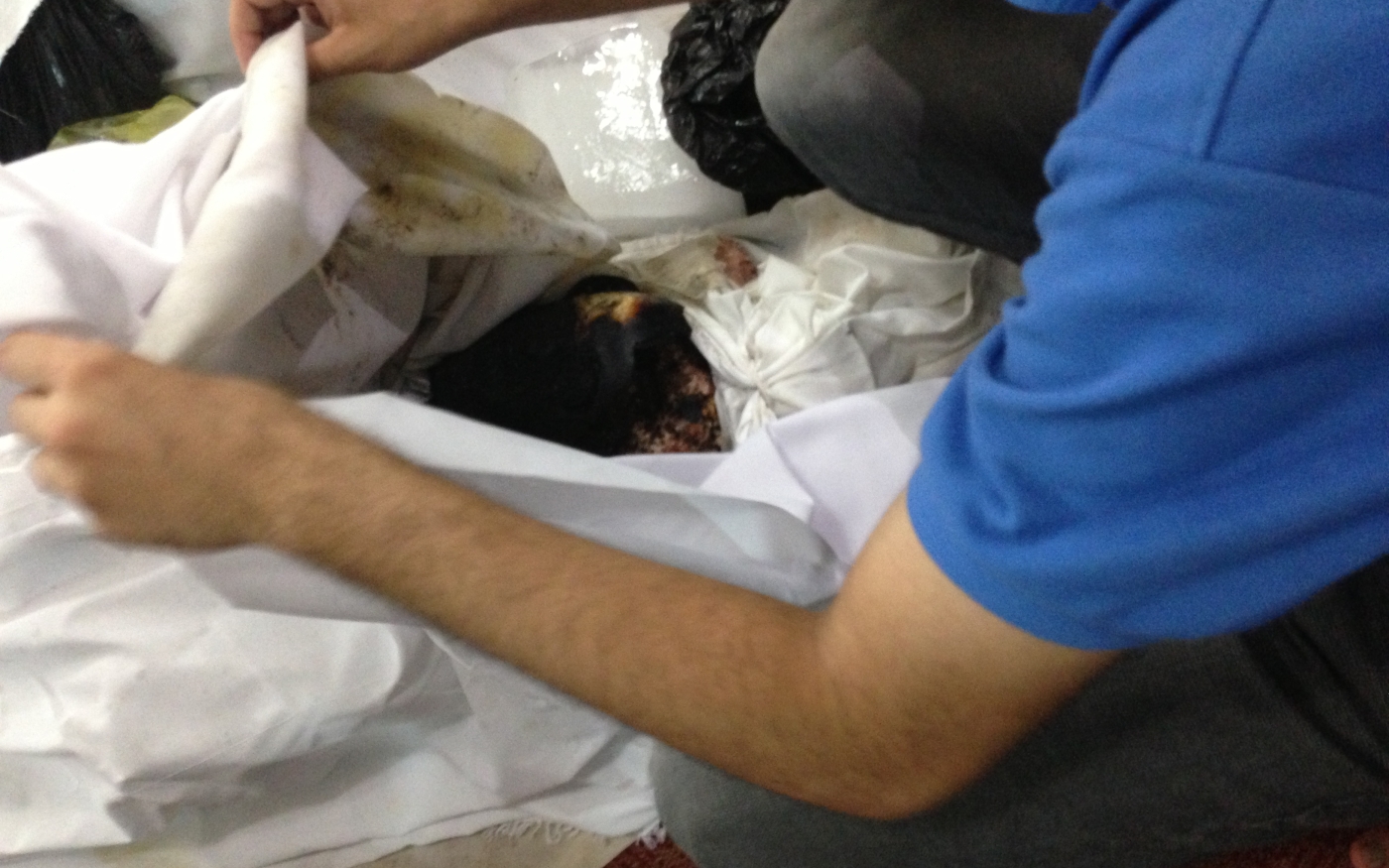 Burnt body of a protester in El-Eman mosque