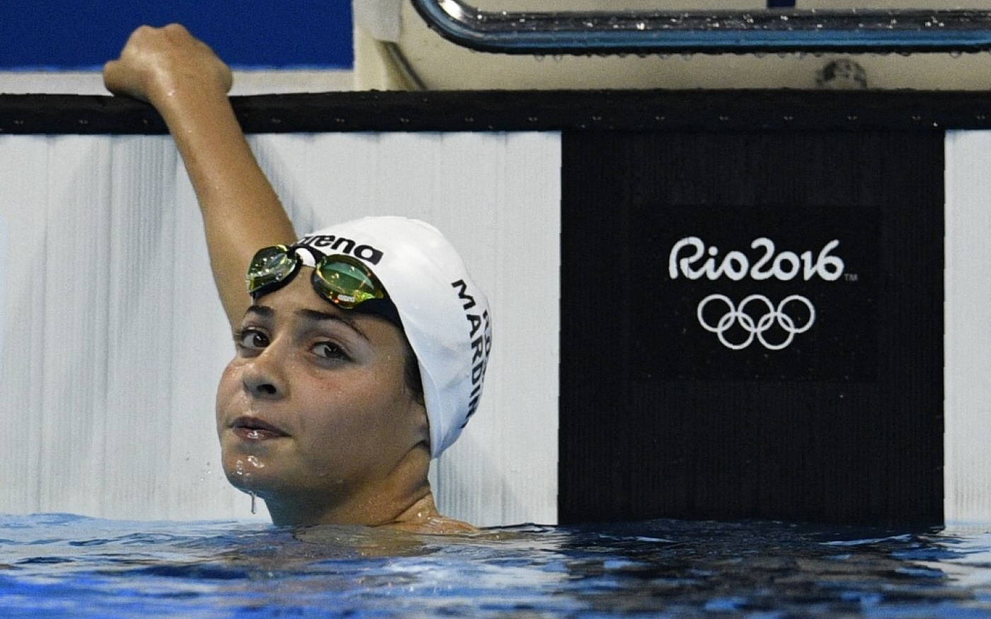 Yusra Mardini, de l’équipe olympique des réfugiés, participe à l’épreuve féminine du 100 m papillon lors de l’épreuve de natation aux Jeux olympiques de Rio 2016 au Stade olympique aquatique de Rio de Janeiro, le 6 août 2016 (AFP/Martin Bureau)