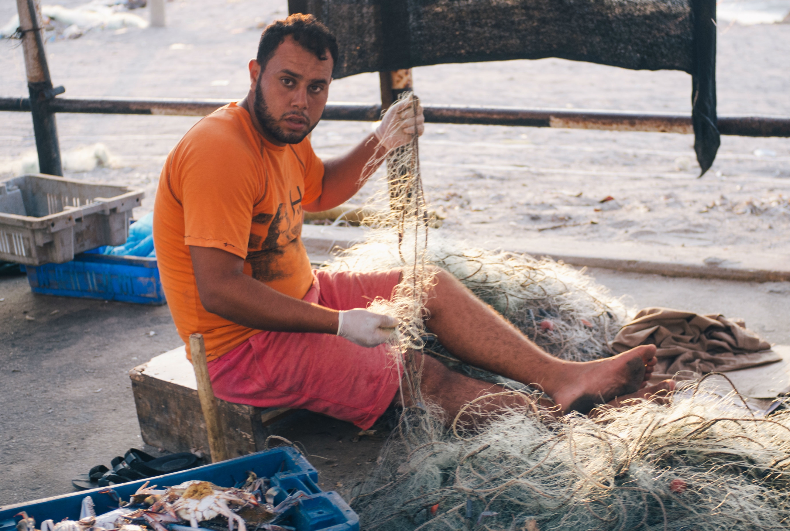 Gaza's connection to the sea may be the strongest in the Shati refugee camp, named after the coast on which it sits. Everywhere there are fishermen, either preparing to go out to sea or else returning with hauls that they sell on the roadside while they fix their nets