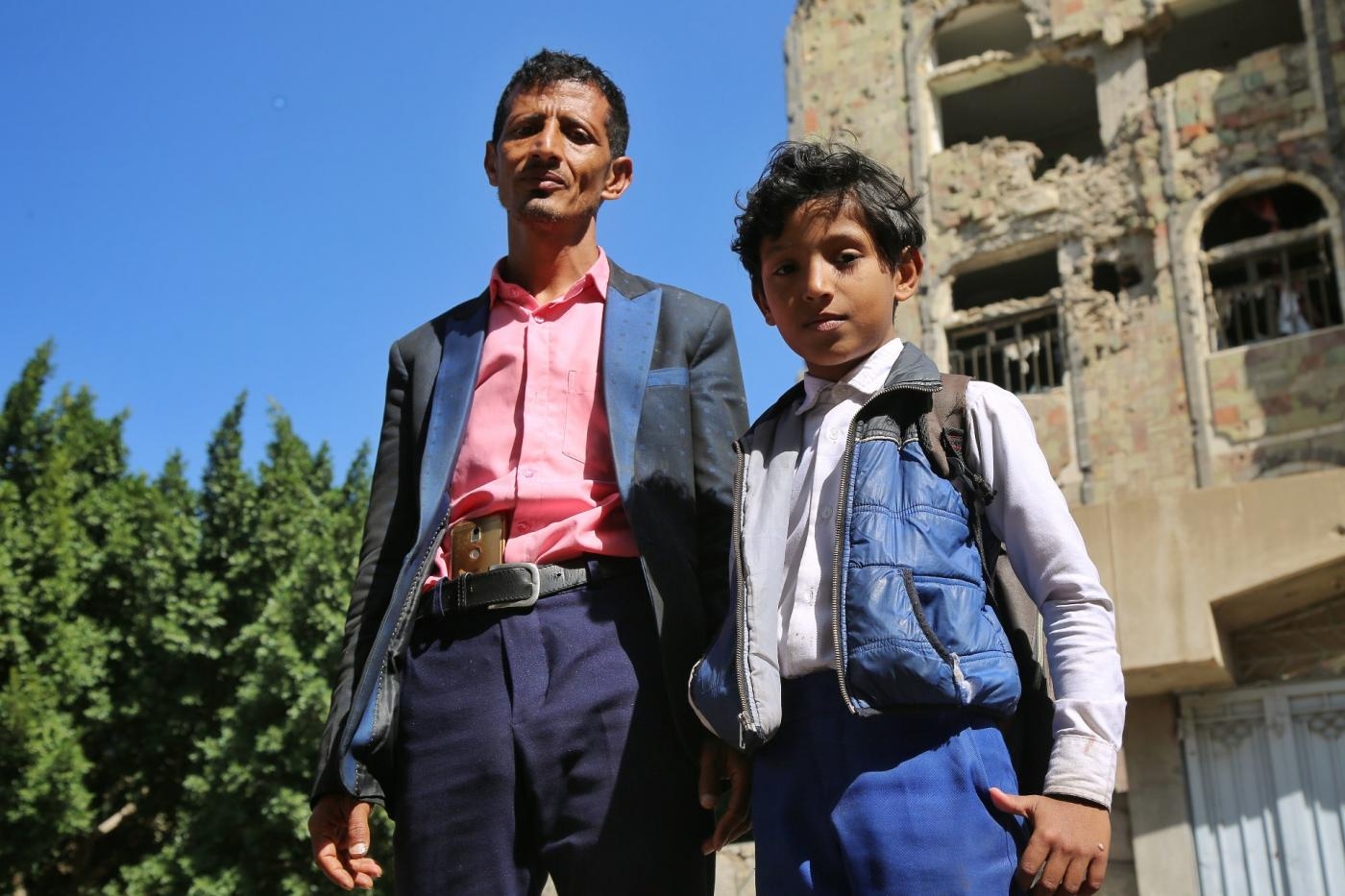 « J’ai perdu le bonheur et ma vie paisible », déplore Saleh al-Hajj, photographié avec son fils Rayan (MEE/Khalid al-Banna)