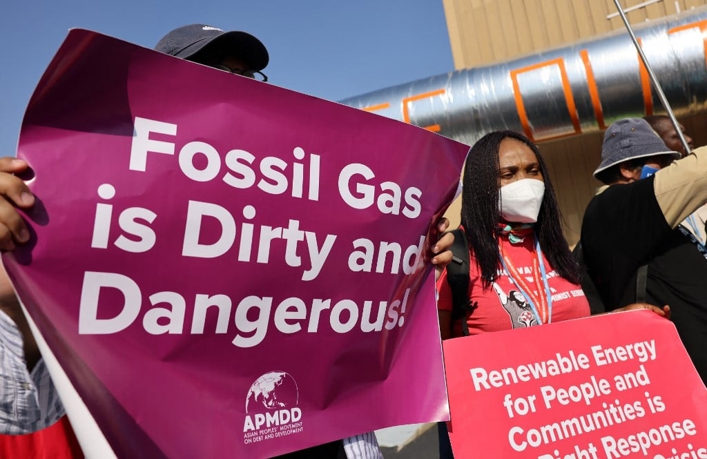 Des manifestants à la Conférence sur le climat (COP27) à Charm el-Cheikh, en Égypte, le 15 novembre 2022 (AFP)