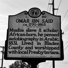 A road sign along a North Carolina Highway pays tribute to Omar Ibn Said (CC/Gerry Dwyer)