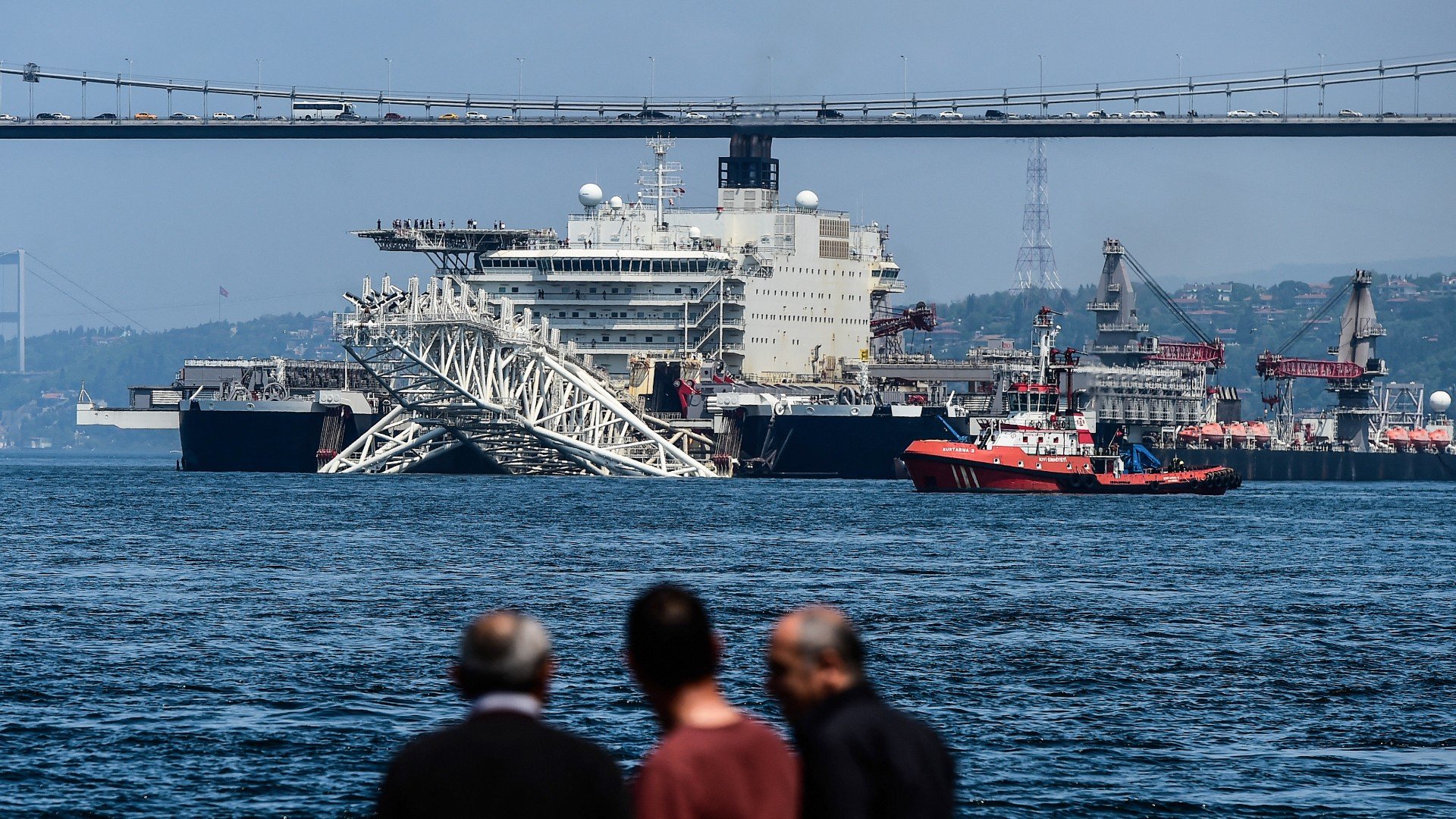 A vessel passes through the Bosphorus following the completion of Line 1 of Gazprom's TurkStream gas pipeline in the Black Sea, connecting Russia and Turkey, in Istanbul, on 2 May, 2018 (AFP)
