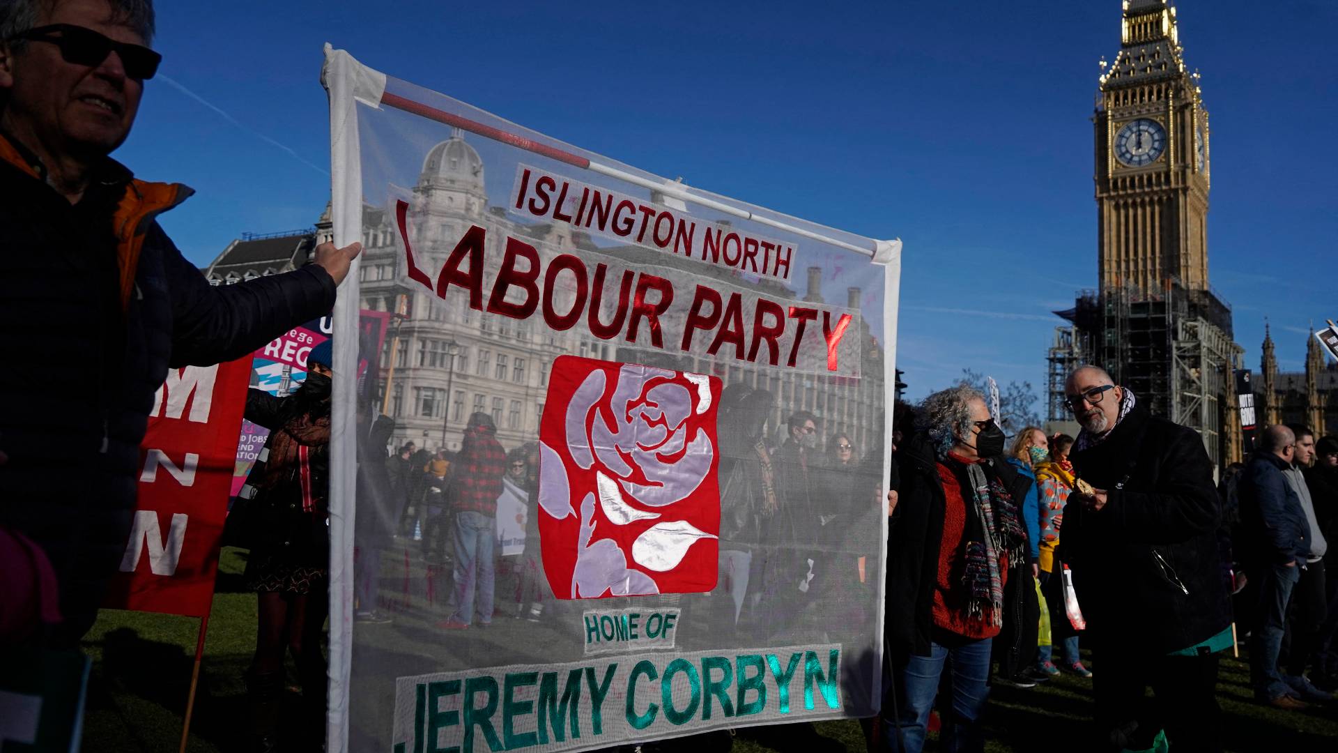 Supporters of former Labour party leader Jeremy Corbyn join demonstrators in Parliament Square at a protest organised by The People's Assembly to demand action to tackle the cost of living crisis in London on February 12, 2022